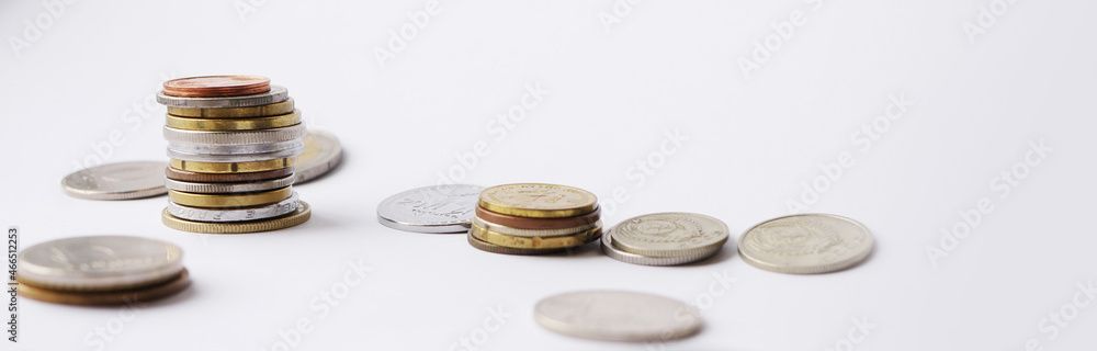 Stack of coins on white background. Finances concept banner. Account profit. Investment money Stack of coins on white background. Finances concept banner. Account profit. Investment money