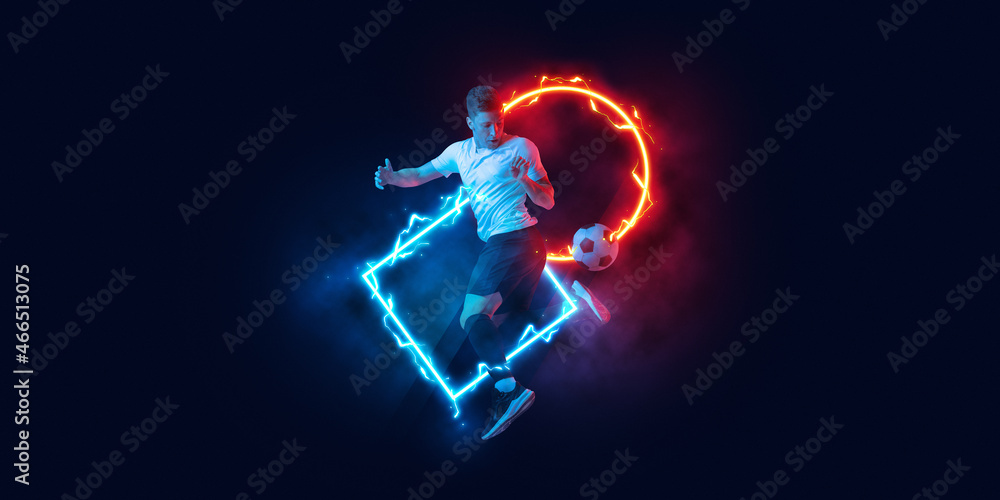 Art collage. Young man, professional football player in motion and action with ball isolated on dark background with neoned geometric figure