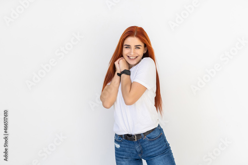 beautiful ginger hair woman on white studio background.