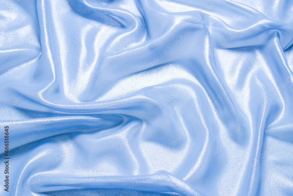 Obraz premium Blue shiny pearl fabric as a background.