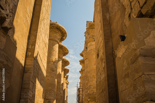 Anscient Temple of Karnak in Luxor - Ruined Thebes Egypt. Huge columns with hieroglyphs in the ancient Karnak temple. Temple of Amon-Ra