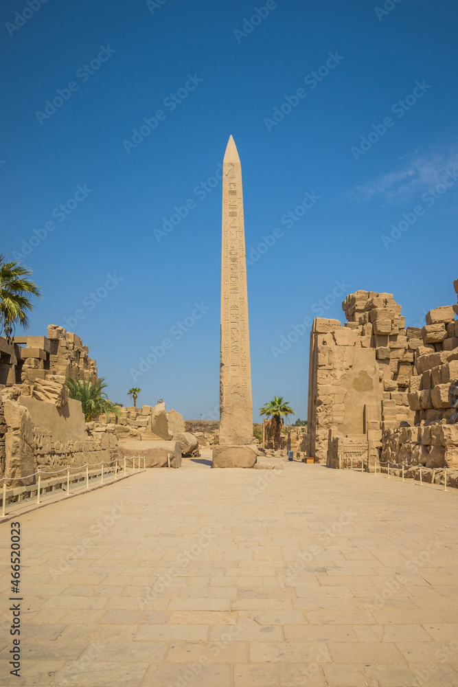 Anscient Temple of Karnak in Luxor - Ruined Thebes Egypt. Sacred obelisk with hieroglyphs in Karnak temple.Temple of Amon-Ra