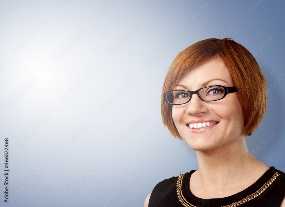 Portrait of happy woman smiling at the camera, standing cute