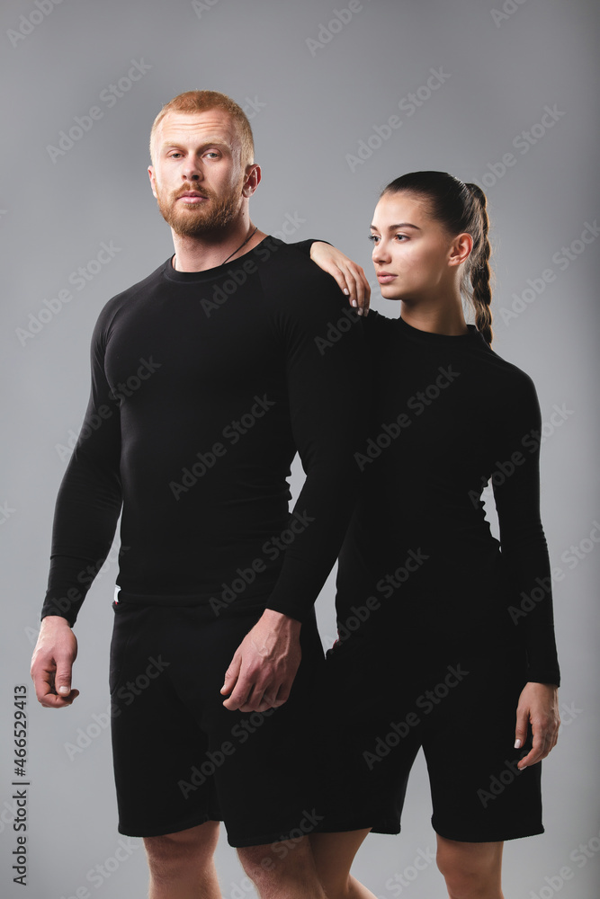 Studio portrait of a young couple in sportswear. Healthy lifestyle Studio portrait of a young couple in sportswear. Healthy lifestyle