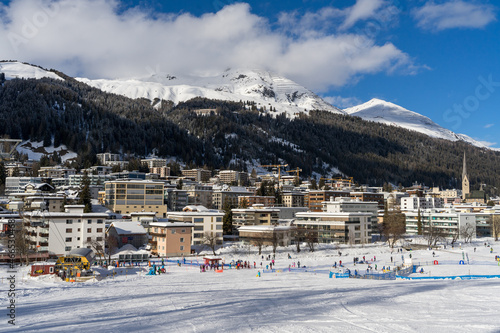 Sunny Winter Day in Davos. View from slope over Davos-platz photo