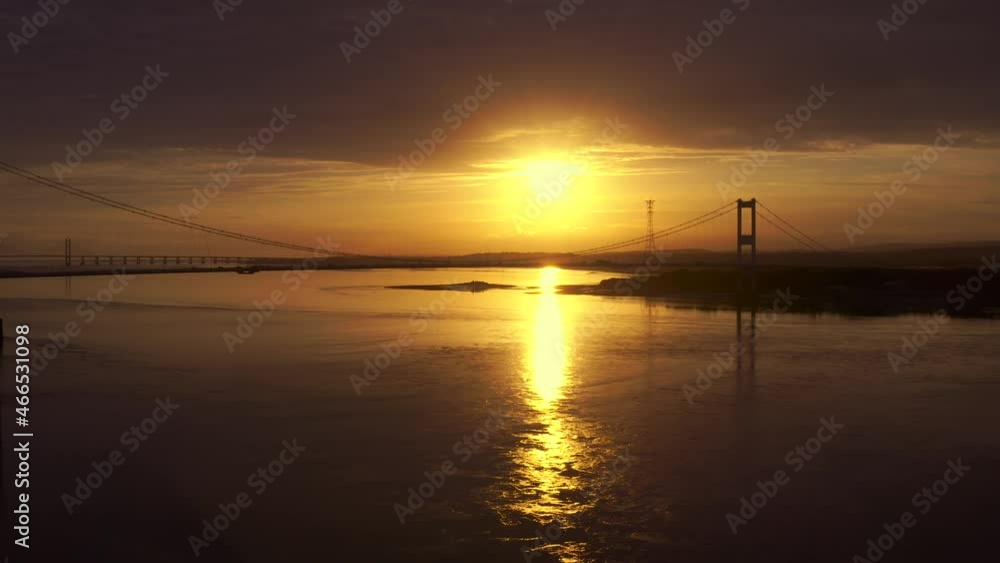 Drifting aerial shot of the Severn Bridge at sunset between England and Wales in the UK Drifting aerial shot of the Severn Bridge at sunset between England and Wales in the UK