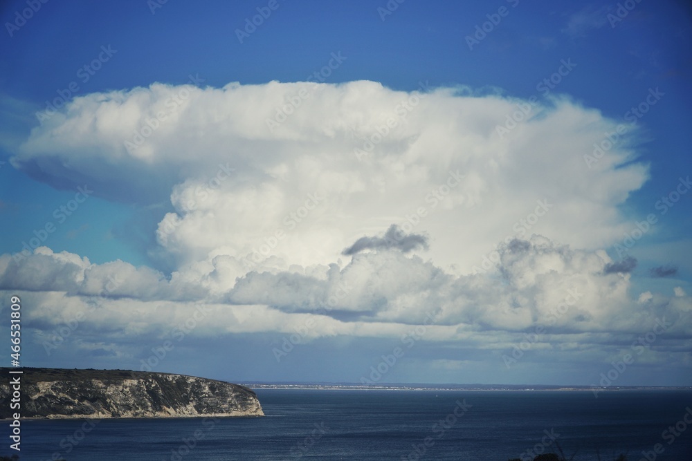 Ballard Point, Swanage, Dorset, chalk cliff with clouds above sea