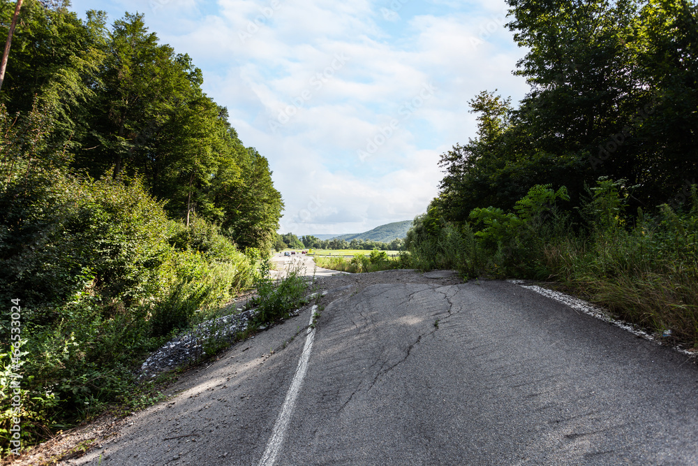 Fototapeta premium Destroyed road consequences of a natural cataclysm