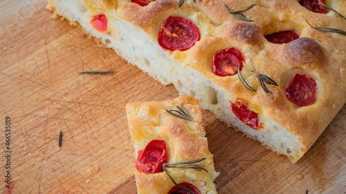 Homemade ciabatta bread (mini pizza) on a board