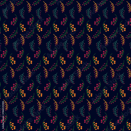 Seamless pattern of assorted withered leaves on blue background