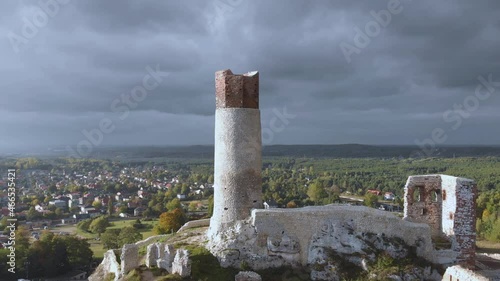 Incredible ruins of Olsztyn Castle (Silesian Voivodeship) fortification in the middle of nature in Poland at sunset, situated on the route of eagles' nests. Jura Park, gothic architecture. Aerial 4k