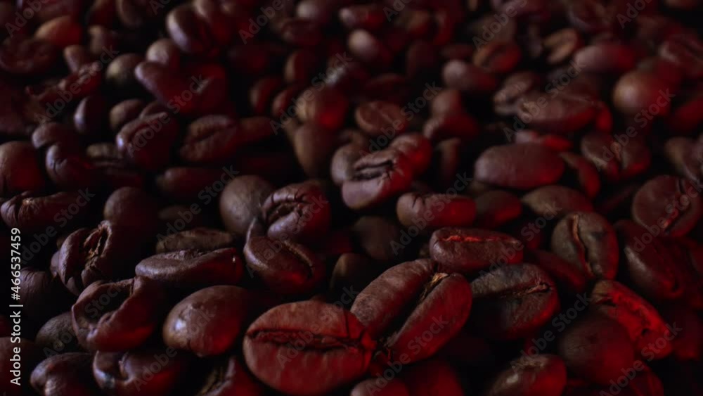 Roasted coffee beans brown. The fruits of the coffee tree are ready to eat. The concept of processing coffee berries. High quality. 4k footage. Roasted coffee beans brown. The fruits of the coffee tree are ready to eat. The concept of processing coffee berries. High quality. 4k footage.
