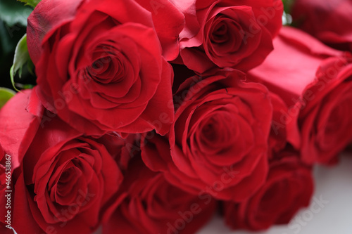 Closeup of large bouquet of red roses background