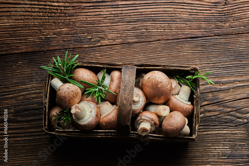 Mushrooms. royal champignon mushrooms in a wooden basket. Rustic style. Top view.