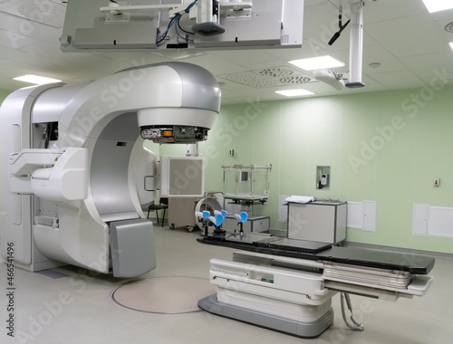 Medical advanced linear accelerator in oncological cancer therapy in a modern hospital. Linear accelerator in a real working environment without a cover.