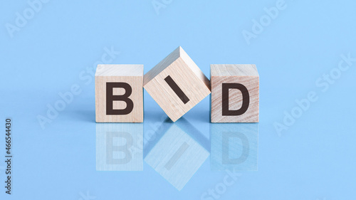BID is an abbreviation of the Business To Government - the text is written on wooden cubes