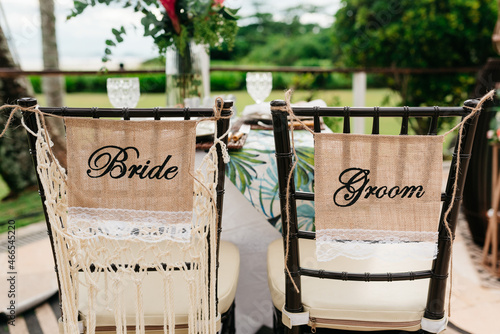 wedding decor - custom chairs for grooms photo