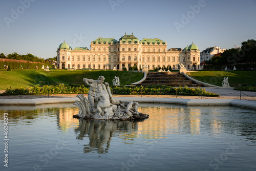 Famous Belvedere castle (Schloss Belvedere) surrounded by gardens with fountains and classic statues, Vienna, Austria