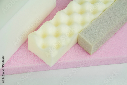 Принти на полотні a piece of foam rubber of different sizes and colors, production of upholstered furniture