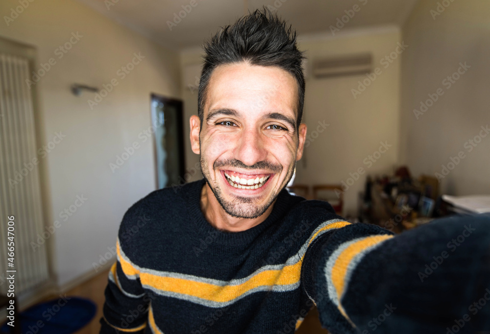 Close up photo of handsome hipster man laughing at room apartment - Happy guy  take selfie at home - Millennial smiling at camera - Youth lifestyle  concept Stock Photo | Adobe Stock