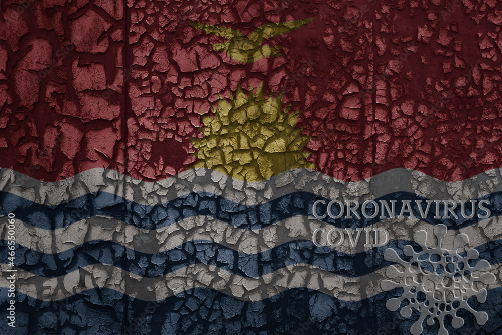 flag of Kiribati on a old metal rusty cracked wall with text coronavirus, covid, and virus picture. flag of Kiribati on a old metal rusty cracked wall with text coronavirus, covid, and virus picture.