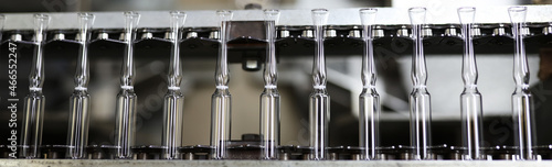 Glass ampoules on a shipping belt