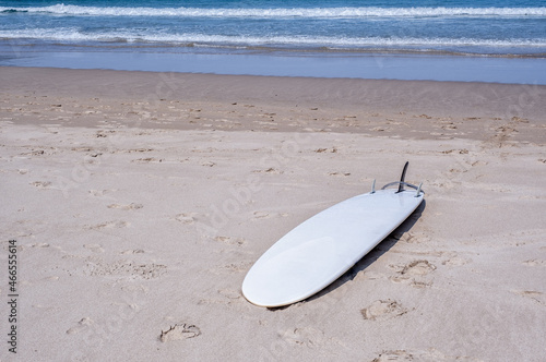 Surf board on the sand on the beach