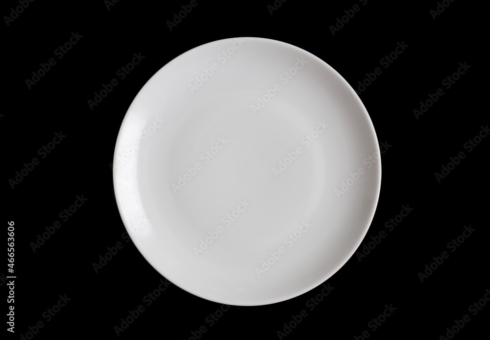 White plate isolated on black background White plate isolated on black background