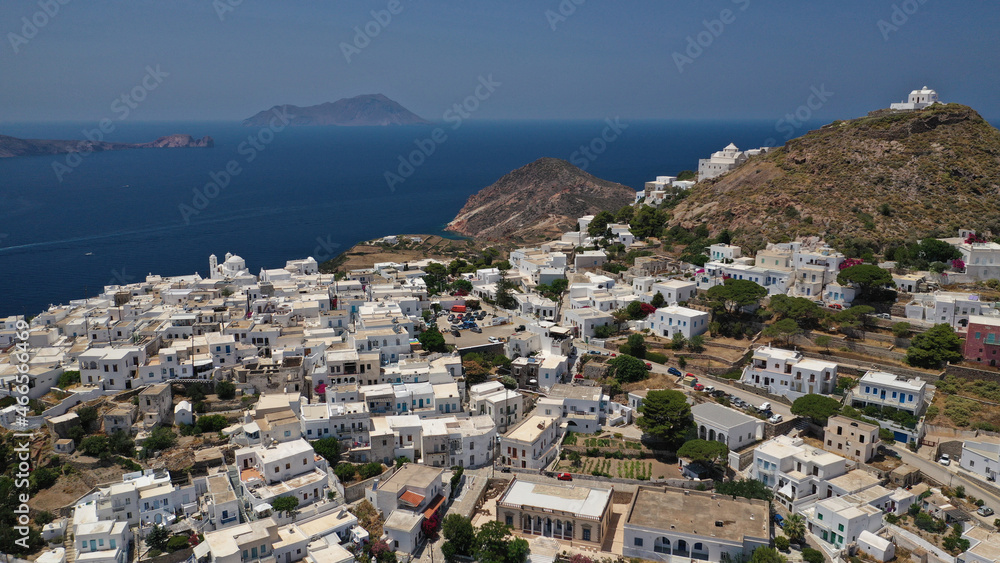 Aerial drone photo of main village of Plaka, main village of Milos island featuring uphill castle and scenic views to Aegean sea, Cyclades, Greece