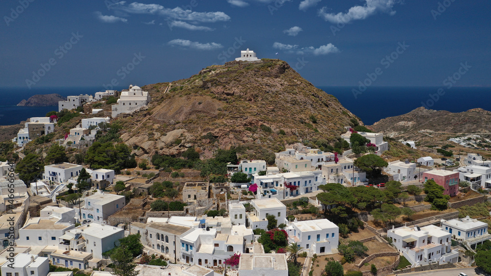 Aerial drone photo of main village of Plaka, main village of Milos island featuring uphill castle and scenic views to Aegean sea, Cyclades, Greece Aerial drone photo of main village of Plaka, main village of Milos island featuring uphill castle and scenic views to Aegean sea, Cyclades, Greece