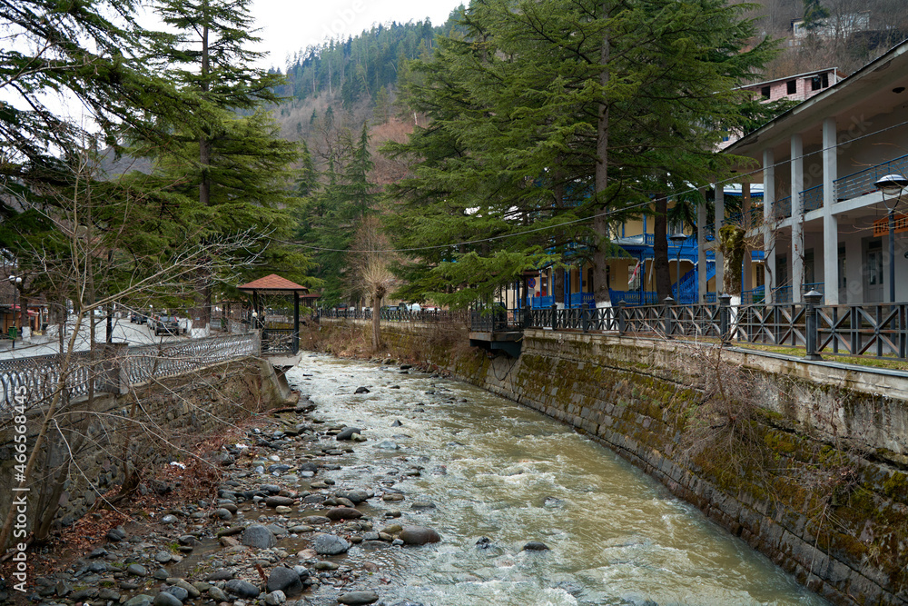 Park in the city of Borjomi. The mountain river flows through Park in the city of Borjomi. The mountain river flows through