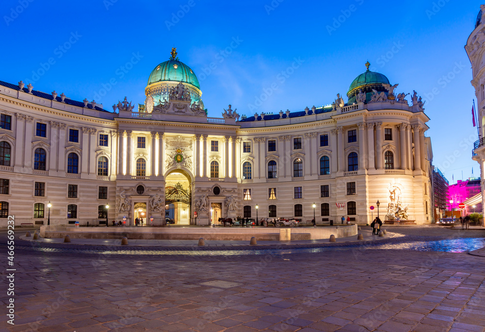 Hofburg palace on St. Michael square (Michaelerplatz) at night, Vienna, Austria