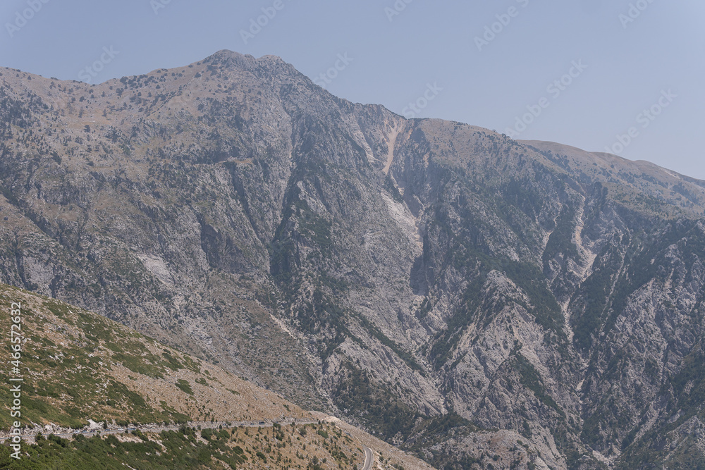 Fototapeta premium The Ceraunian Mountains, a mountain range located in the Balkan country of Albania is a beautiful sight to see when traveling to the small beach village of Dhermi.