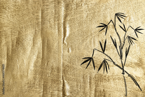 Gold wooden background bamboo plant sketch. Golden texture