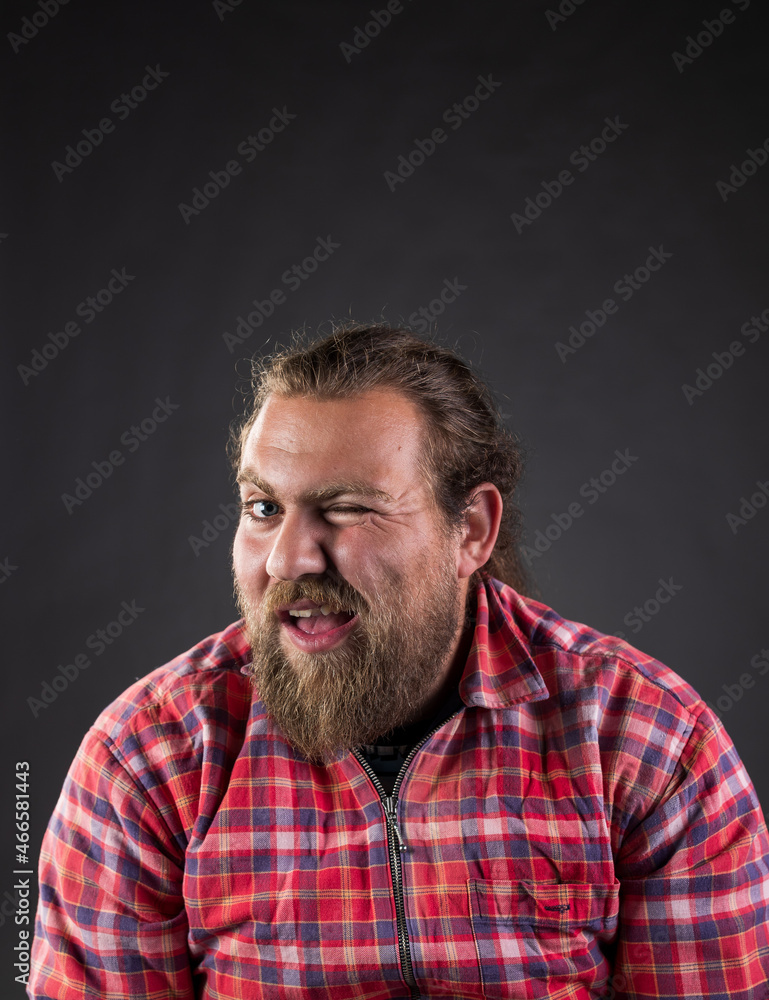 Man winking in studio