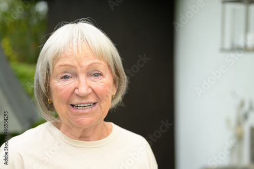 Portrait of an attractive smiling friendly senior lady