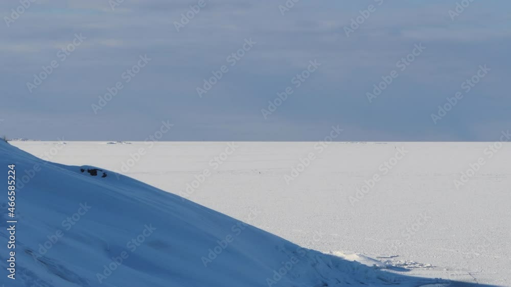 Baltic sea, Finland. Snow covered frozen sea. Cold sunny february day Baltic sea, Finland. Snow covered frozen sea. Cold sunny february day