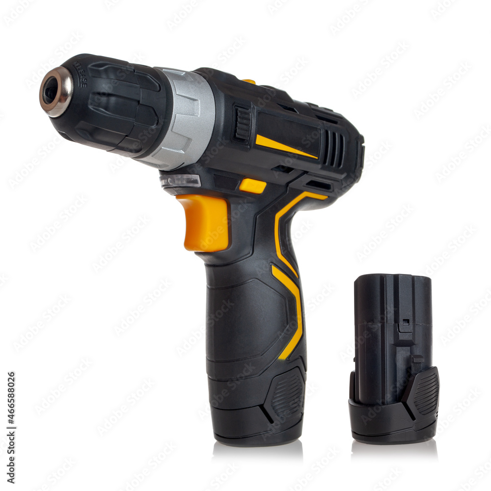 Electric screwdriver, drill with removable battery, spare, additional, isolated on a white background Electric screwdriver, drill with removable battery, spare, additional, isolated on a white background