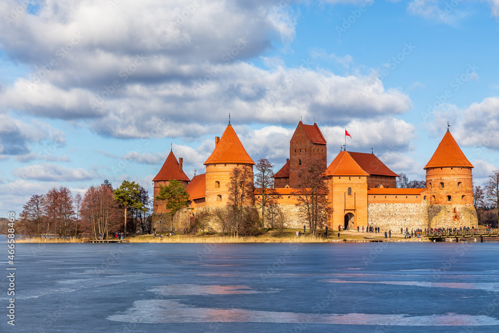 Trakai Island Castle orange walls and towers, lake Galve, Republic of Lithuania