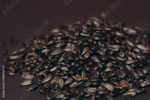 natural product sunflower seeds handing close-up food