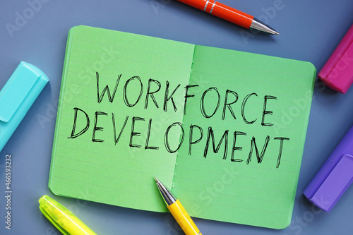 Financial concept meaning Workforce Development with sign on the piece of paper.