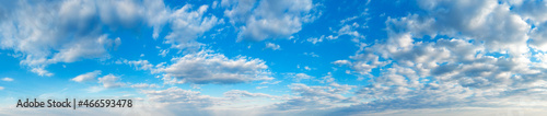 Blue Sky background with tiny Clouds. Panorama background