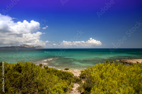 The beautiful beach front on the Island of Majorca in Spain, showing the beautiful beach front on a sunny summers day