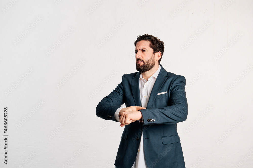 bearded adult male in jacket and shirt with copy space in a studio shot with white background. bearded adult male in jacket and shirt with copy space in a studio shot with white background.