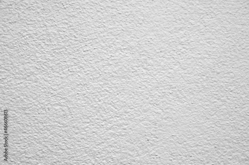 The rough surface of the wall or concrete floor is painted gray and white for the background.