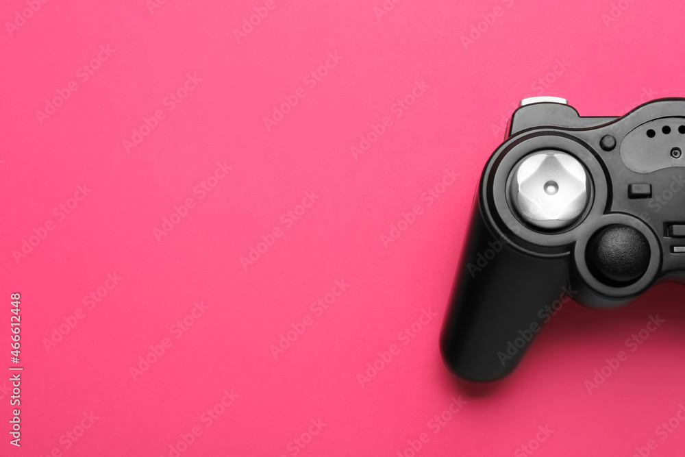 Modern joystick on color background, closeup Modern joystick on color background, closeup