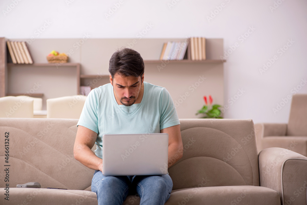 Young male freelancer working from home Young male freelancer working from home