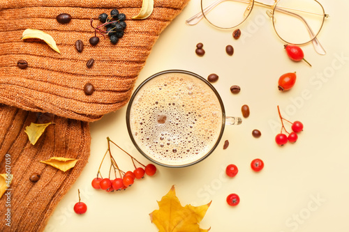 Fototapeta Naklejka Na Ścianę i Meble -  Autumn composition with cup of coffee on color background