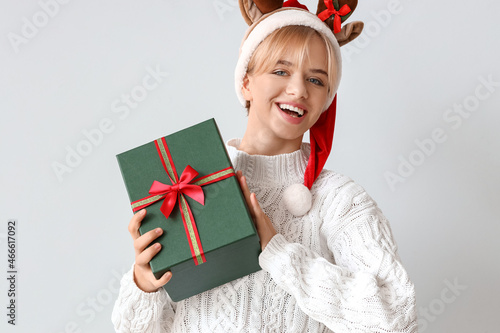 Beautiful young woman with ...