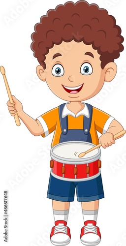 Cartoon little boy playing drums